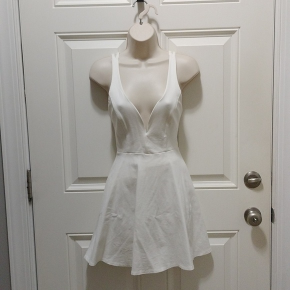 Lulus Dresses & Skirts - Lulu's White Sleeveless Plunge Mini Dress Size S